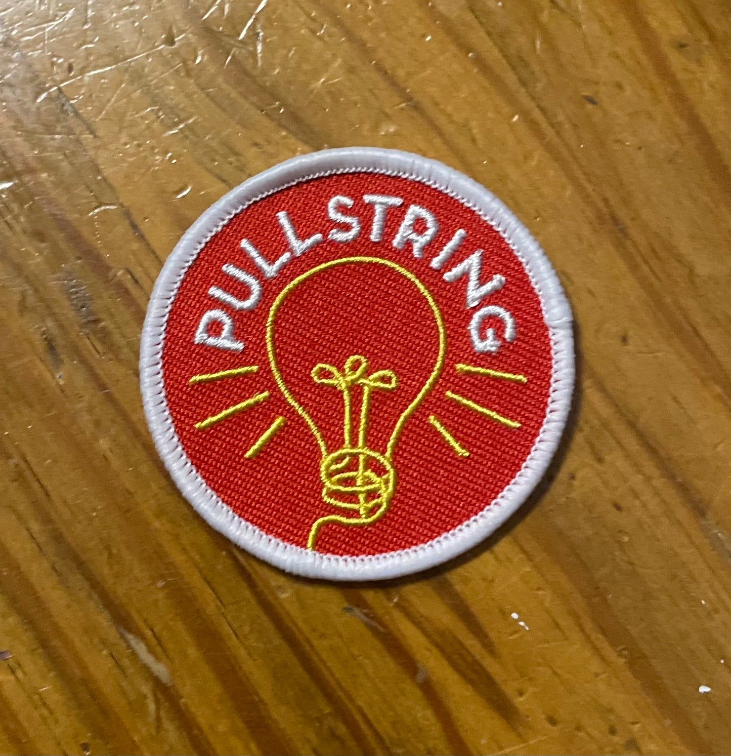 Pullstring Iron-On Patch (Red Circle Logo)